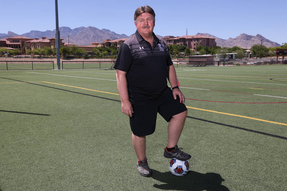 Bob Chinn, head coach of the Faith Lutheran girl's varsity team, poses for a photo at Faith Lut ...