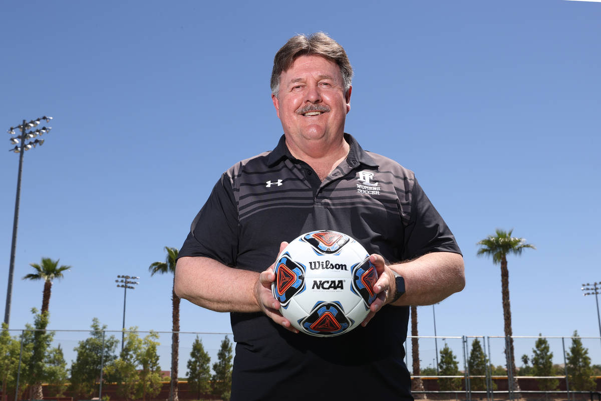 Bob Chinn, head coach of the Faith Lutheran girl's varsity team, poses for a photo at Faith Lut ...