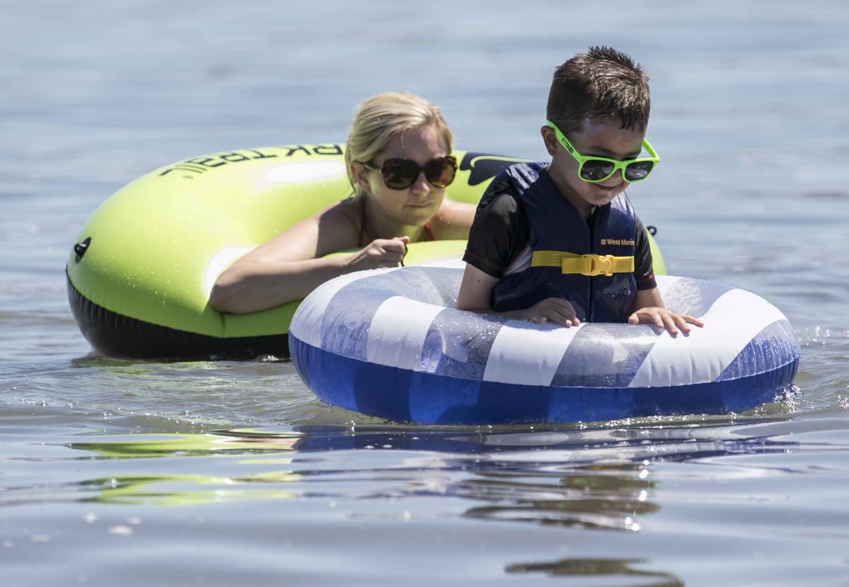 Kristen Holzhause plays with her son Benjamin, 5, at Boulder beach in the Lake Mead National Re ...