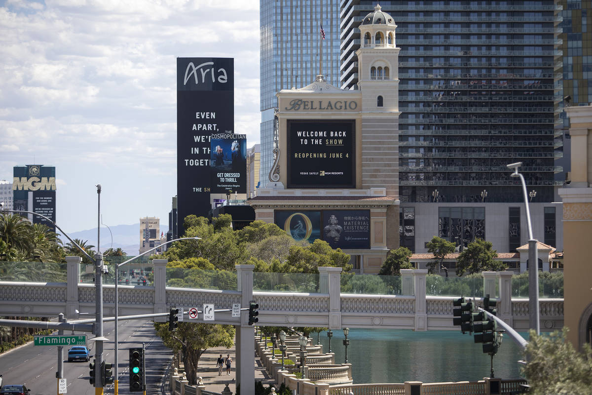 The Bellagio marquee says the hotel and casino, owned big MGM Resorts International, will open ...