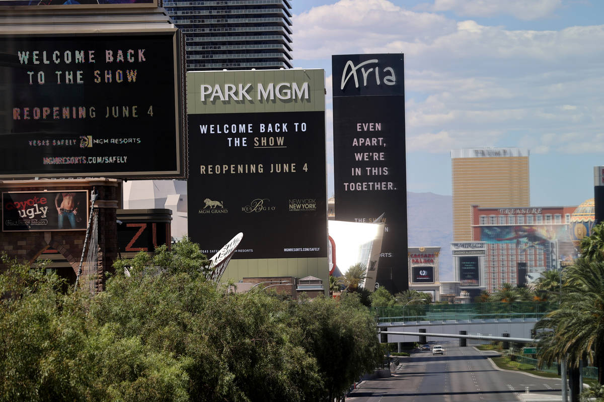 Marquees for MGM Resorts International properties on the Strip in Las Vegas, including from lef ...