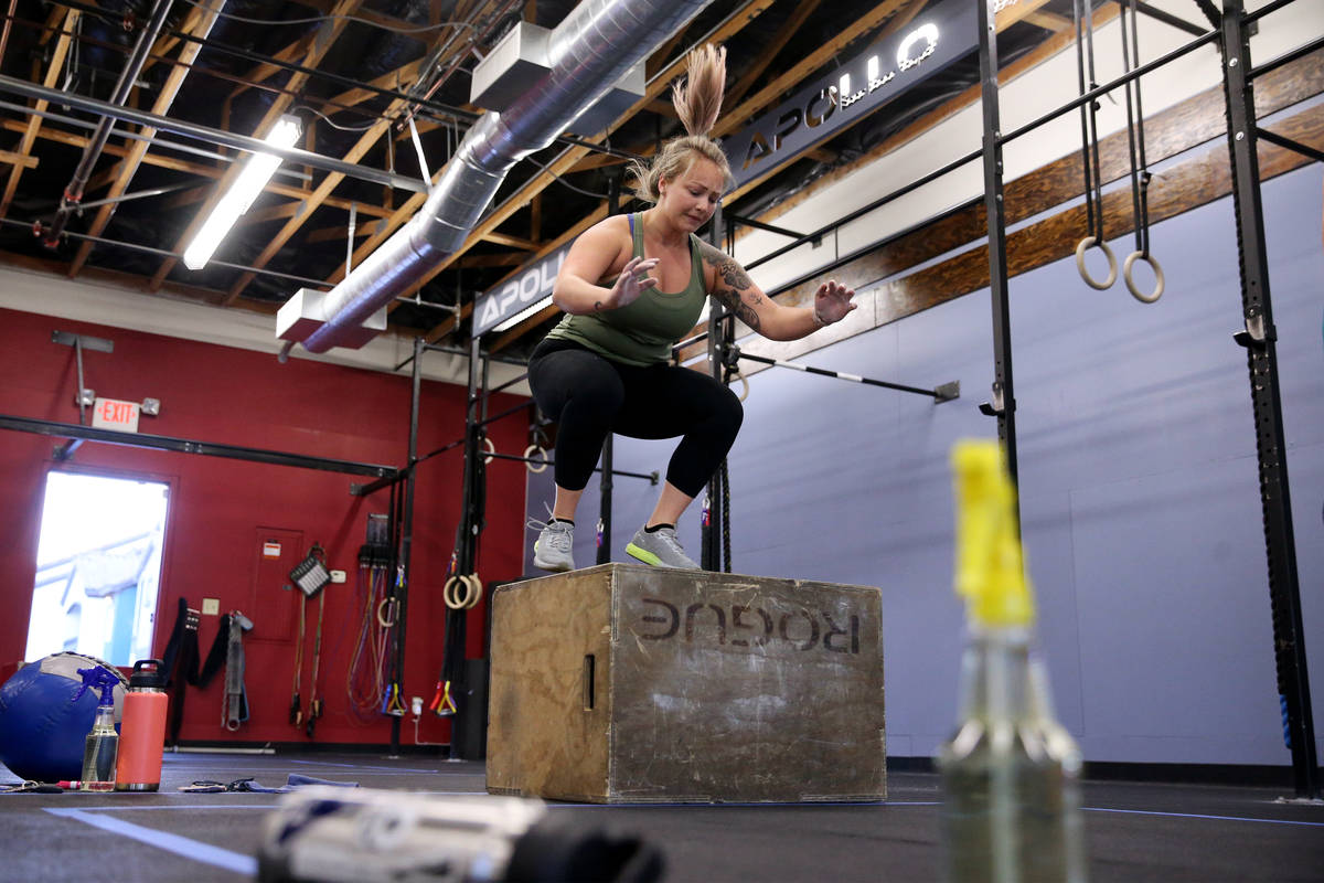 Kelci Swartz works out during a class at Crossfit Apollo in Las Vegas, Friday, May 29, 2020. Th ...