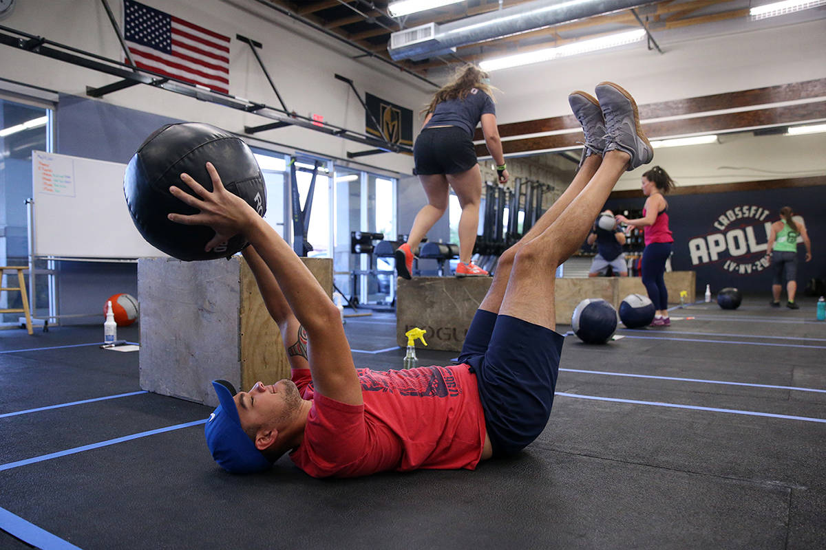 Peter Rivera works out during a class at Crossfit Apollo in Las Vegas, Friday, May 29, 2020. Th ...
