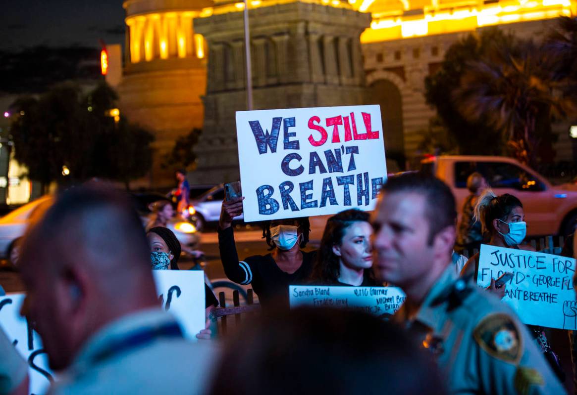 Demonstrators gather to demand justice for George Floyd along the Las Vegas Strip on Thursday, ...