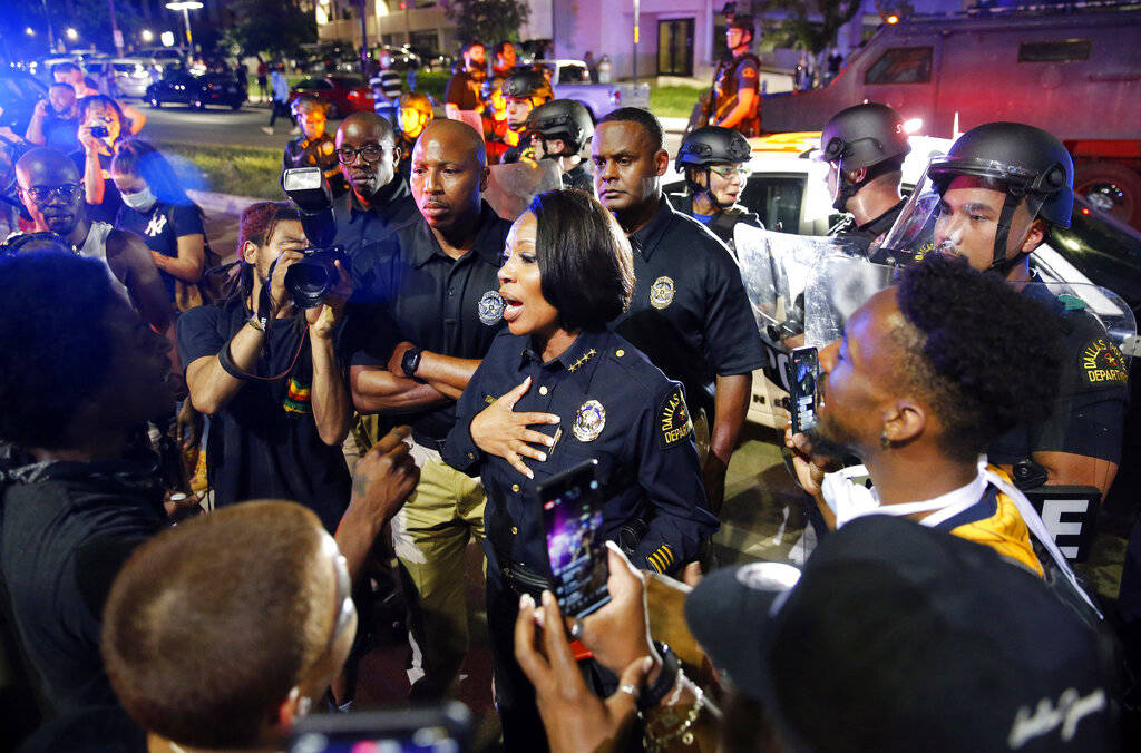 Dallas Police Chief Reneé Hall confronts protestors at Young St. and S. Griffin St. in dow ...