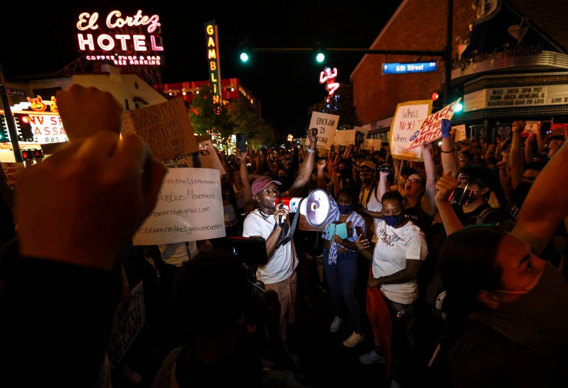 A man speaks as people protest the death of George Floyd in downtown Las Vegas on Saturday, May ...