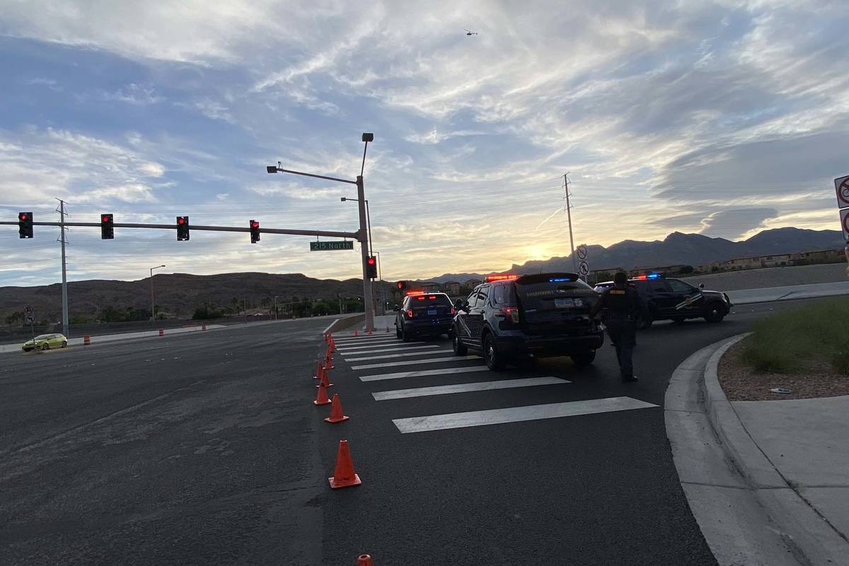 The Nevada Highway Patrol blocks the northbound onramp to the 215 Beltway at Sahara Avenue near ...
