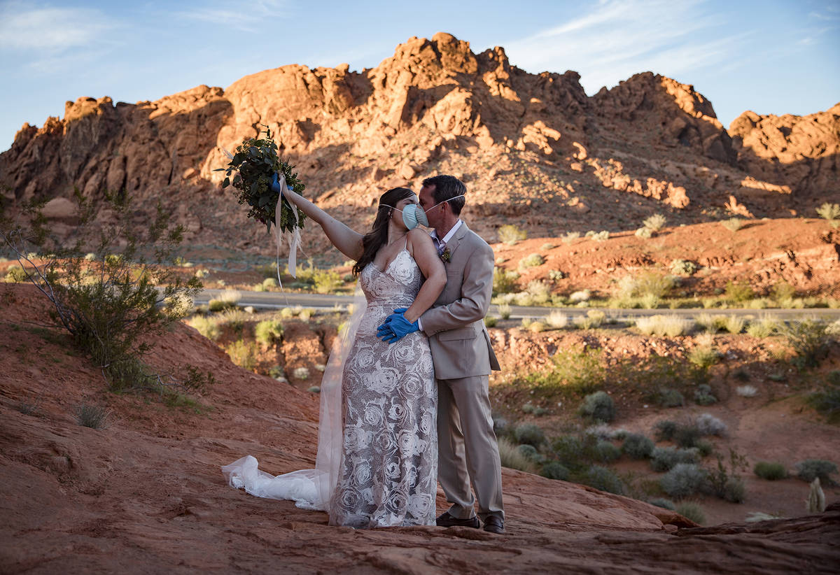 Ashley and Will Hinder pose for photos to celebrate their special day at Valley of Fire State P ...