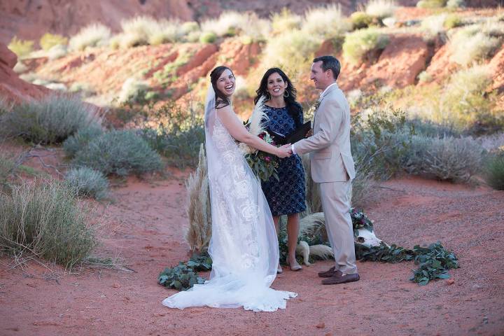 Amanda Monk presides over the wedding ceremony of Ashley Johns and Will Hinder at Valley of Fir ...