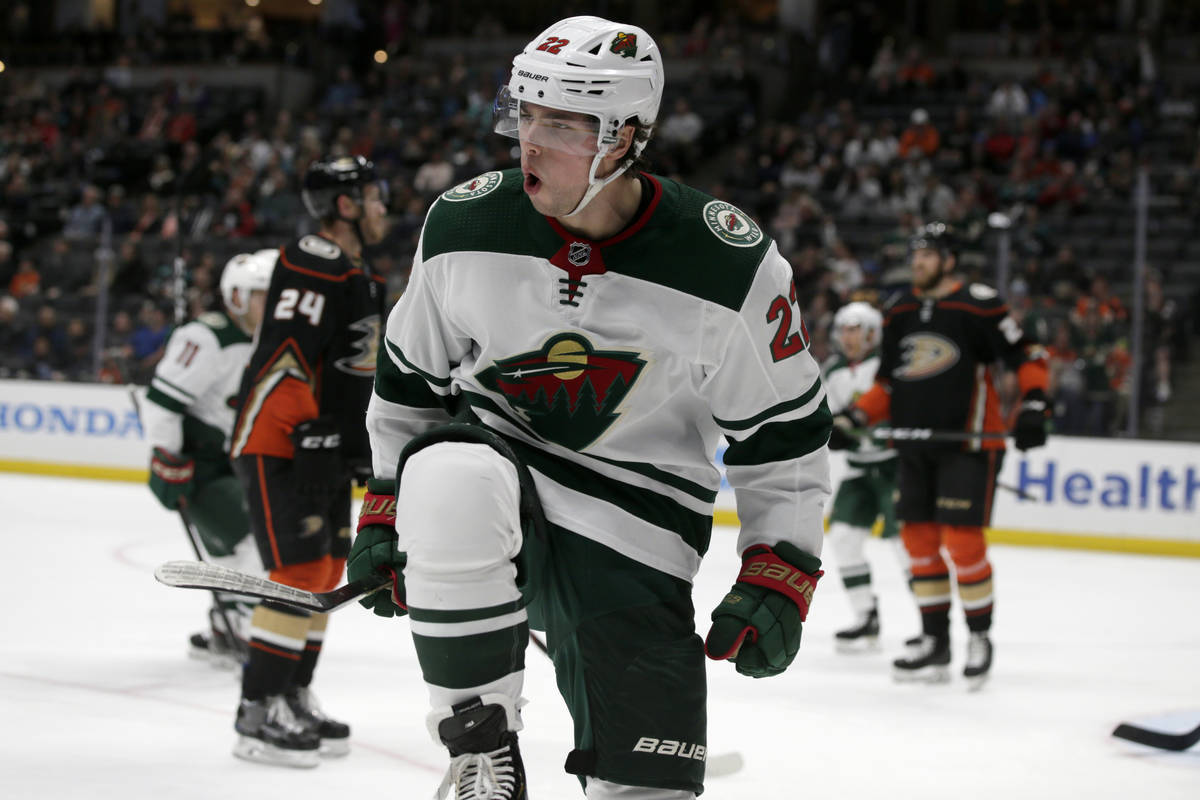 Minnesota Wild left wing Kevin Fiala, center, of Switzerland, reacts after scoring against the ...