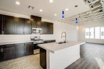 This move-in-ready home at Paragon Lofts features three-stories with two large bedroom suites, ...