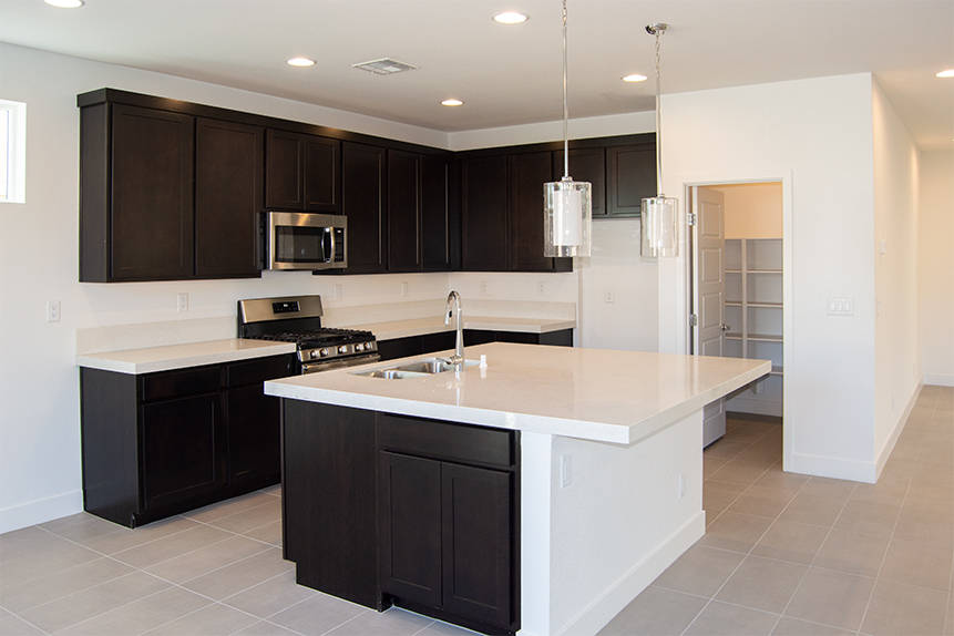 Paragon Parkside includes standard features such as quartz countertops, 42-inch upper cabinets, ...