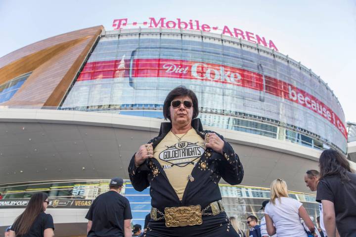 Golden Knights fan and Elvis impersonator Jeff Stanulis outside T-Mobile Arena before the start ...