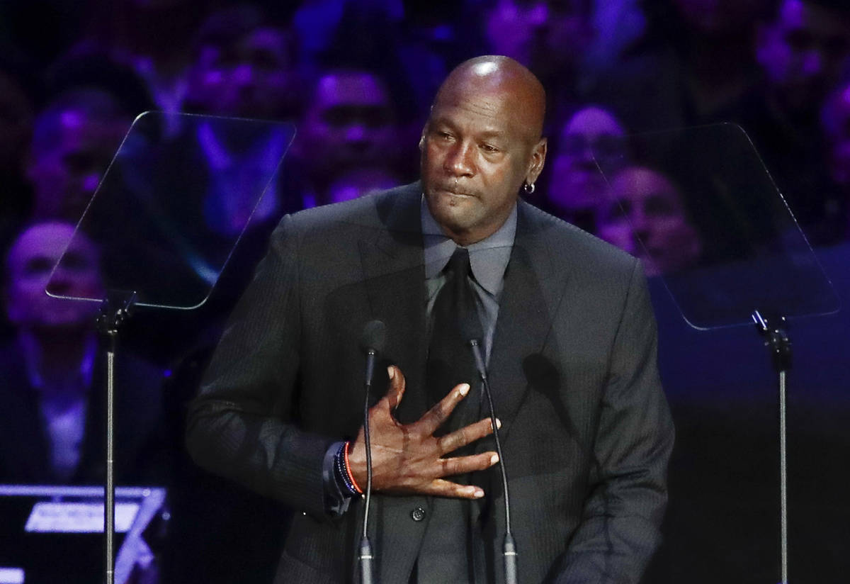 In this Feb. 24, 2020, file photo, former NBA player Michael Jordan reacts while speaking durin ...