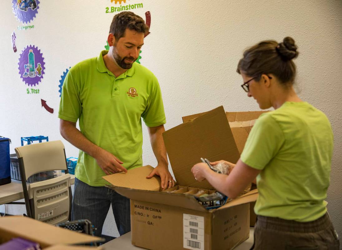 Leo Silva, left, co-owner and teacher, and his wife Elise Silva, right, co-owner and teacher, s ...