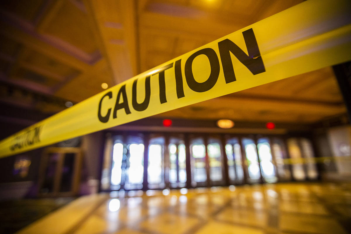Caution tape closes off the gaming floor from a main entrance during the closure of TI due to t ...