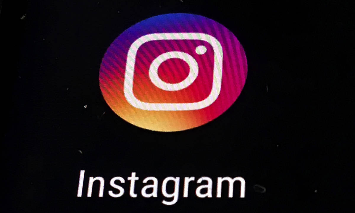 FILE - In this Nov. 29, 2018 file photo, the Instagram app logo is displayed on a mobile screen ...