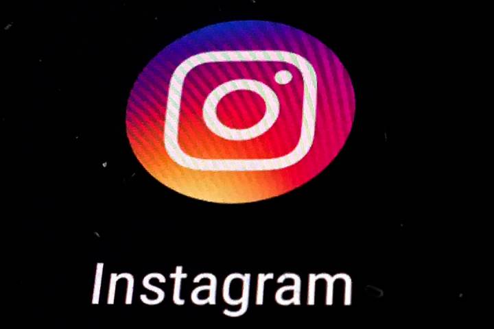 FILE - In this Nov. 29, 2018 file photo, the Instagram app logo is displayed on a mobile screen ...