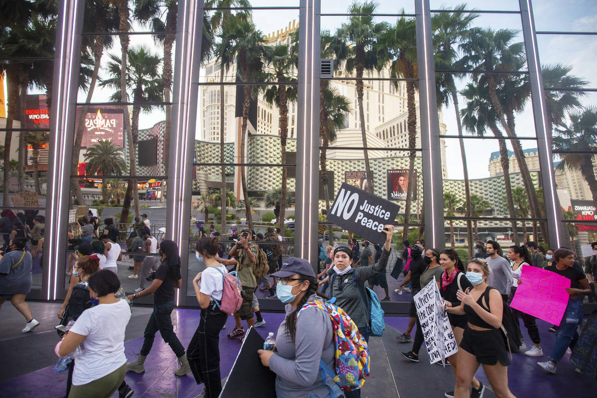 A large crowd protests on the Strip on Monday, June 1, 2020, in Las Vegas as riots continue thr ...