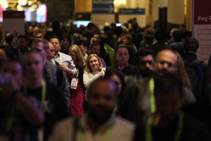 Attendees fill the halls at the Sands Expo and Convention Center during CES in Las Vegas, Tuesd ...