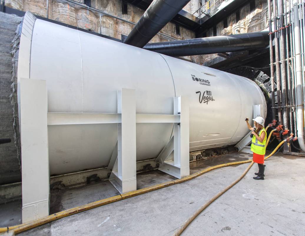 Media get a first glimpse at a tunnel boring machine at the future location of one of the under ...