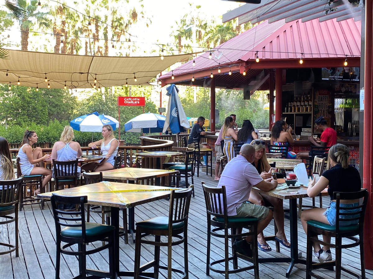 On the patio of Carlos ‘N Charlie’s Mexican restaurant at the Flamingo, diners enjoyed the ...