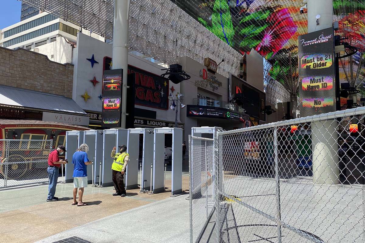 A security checkpoint at Fremont Street and Las Vegas Boulevard on Thursday, June 4, 2020. (Al ...