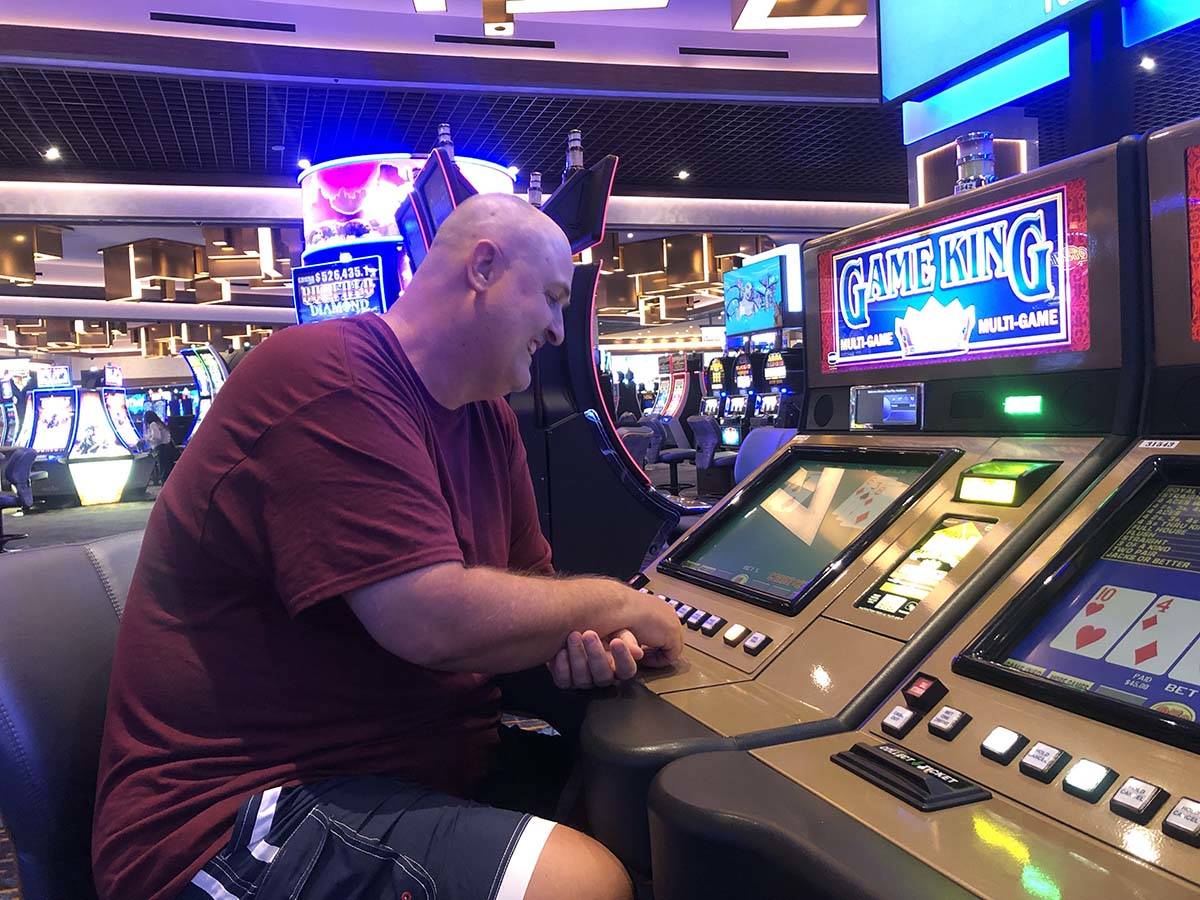 Winston Hausen sits at a video poker machine around 9:30 a.m. at the Strat on Thursday, June 4, ...