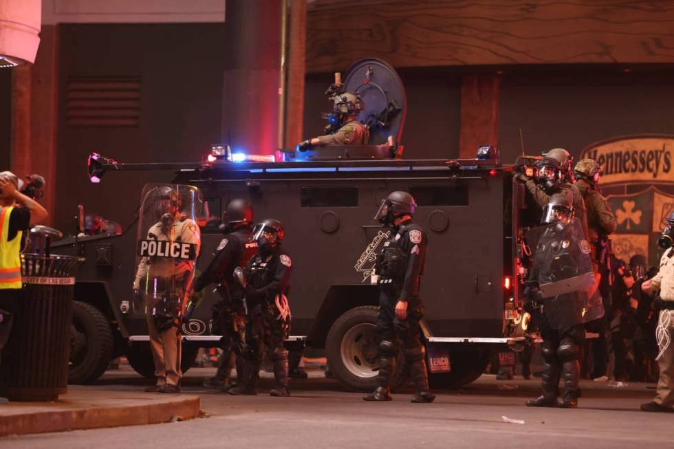 SWAT clears the intersection of Fremont Street and Las Vegas Boulevard South during a Black Liv ...