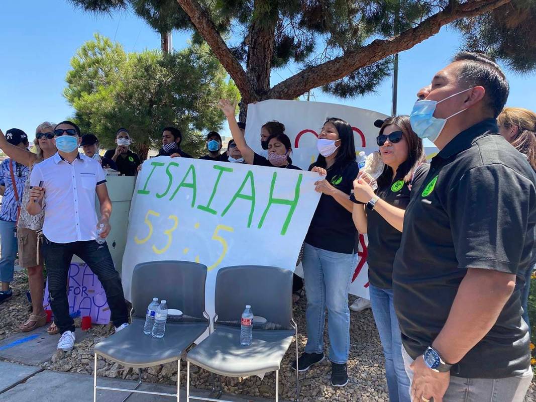 Luis Sanchez of Eagles Christian Family Center leads a prayer vigil for Las Vegas officer Shay ...