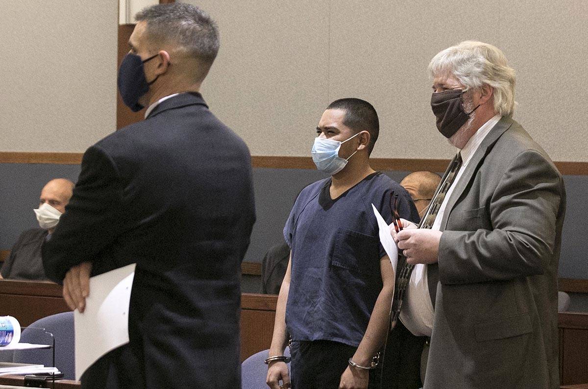 Edgar Samaniego, charged in shooting of Las Vegas police officer, appears in court with his def ...