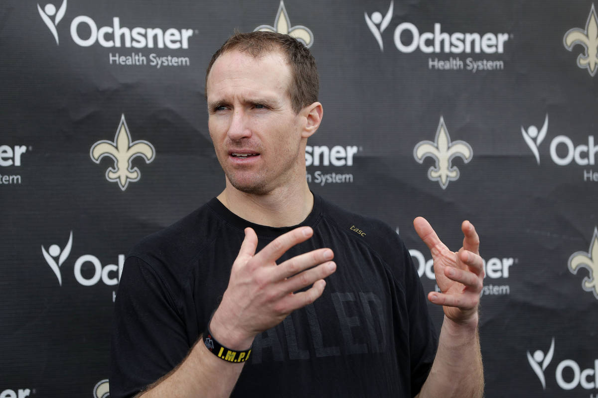 New Orleans Saints quarterback Drew Brees talks to reporters after their NFL football practice ...