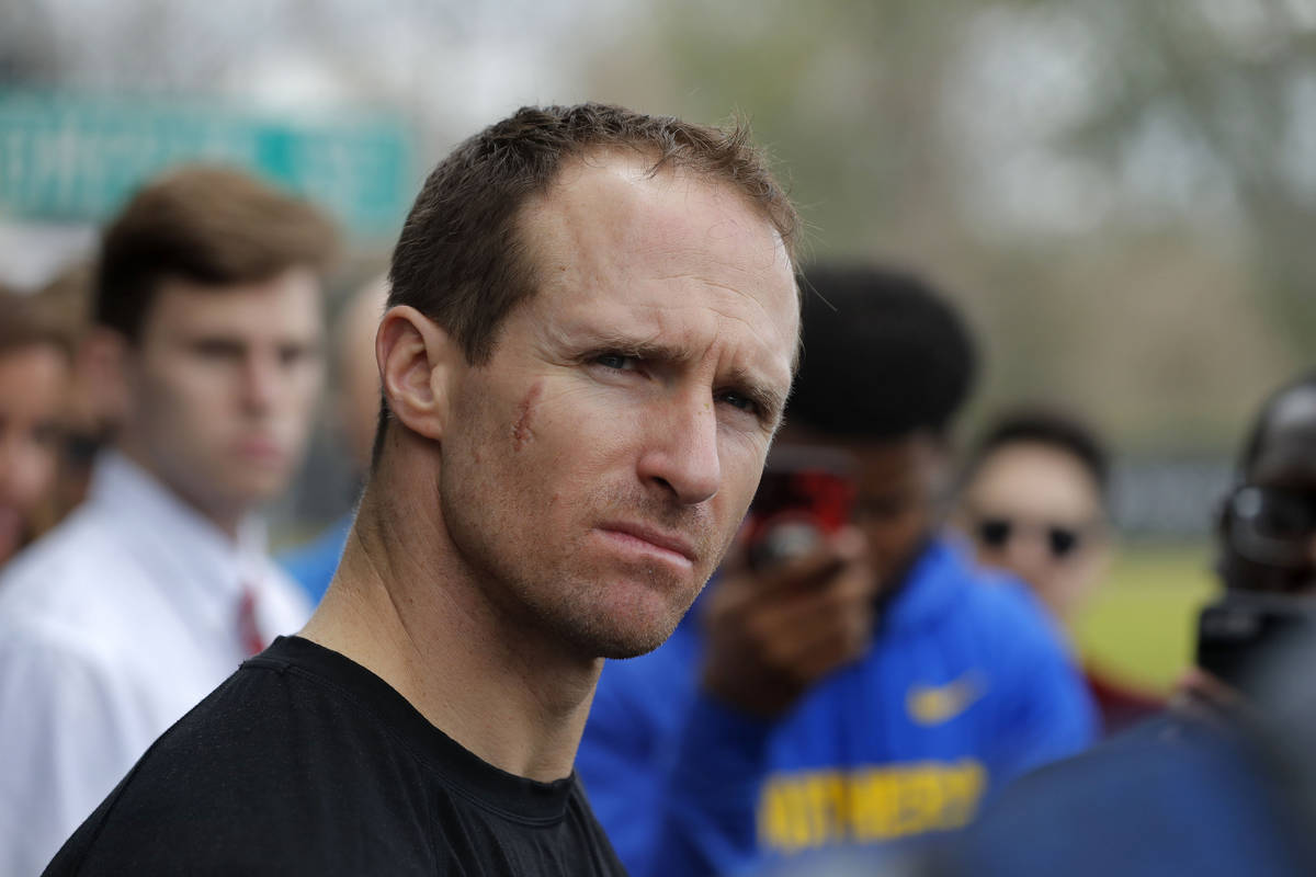 New Orleans Saints quarterback Drew Brees talks to reporters after their NFL football practice ...