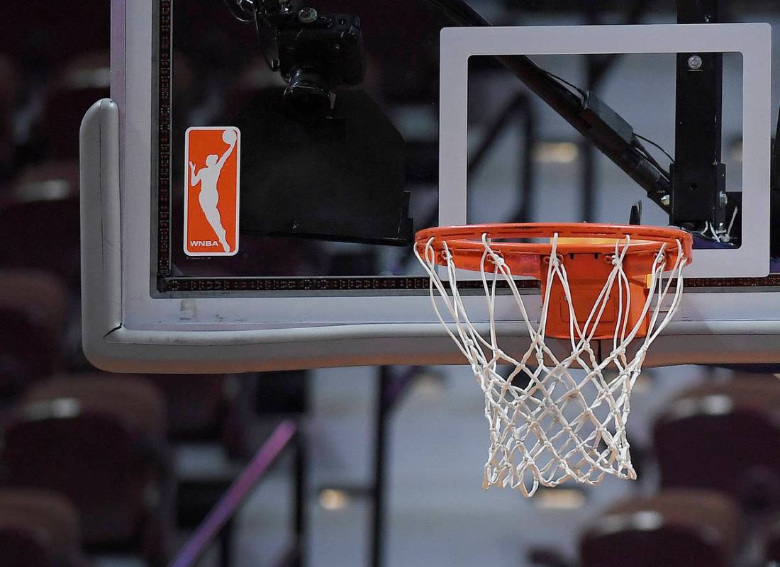 The WNBA logo and hoop are seen at a WNBA basketball game at Mohegan Sun Arena, Tuesday, May 14 ...