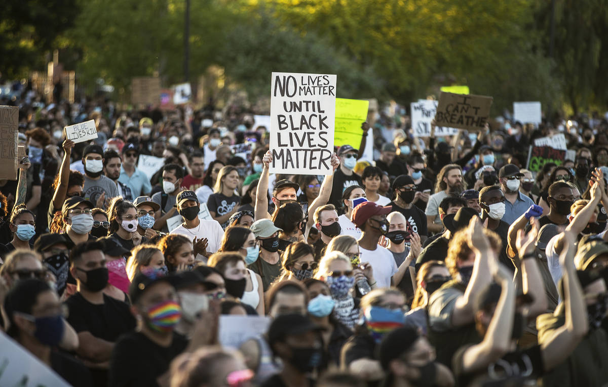 Thousands of people showed up at a Black Lives Matter event at Kianga Isoke Palacio Park on Fri ...