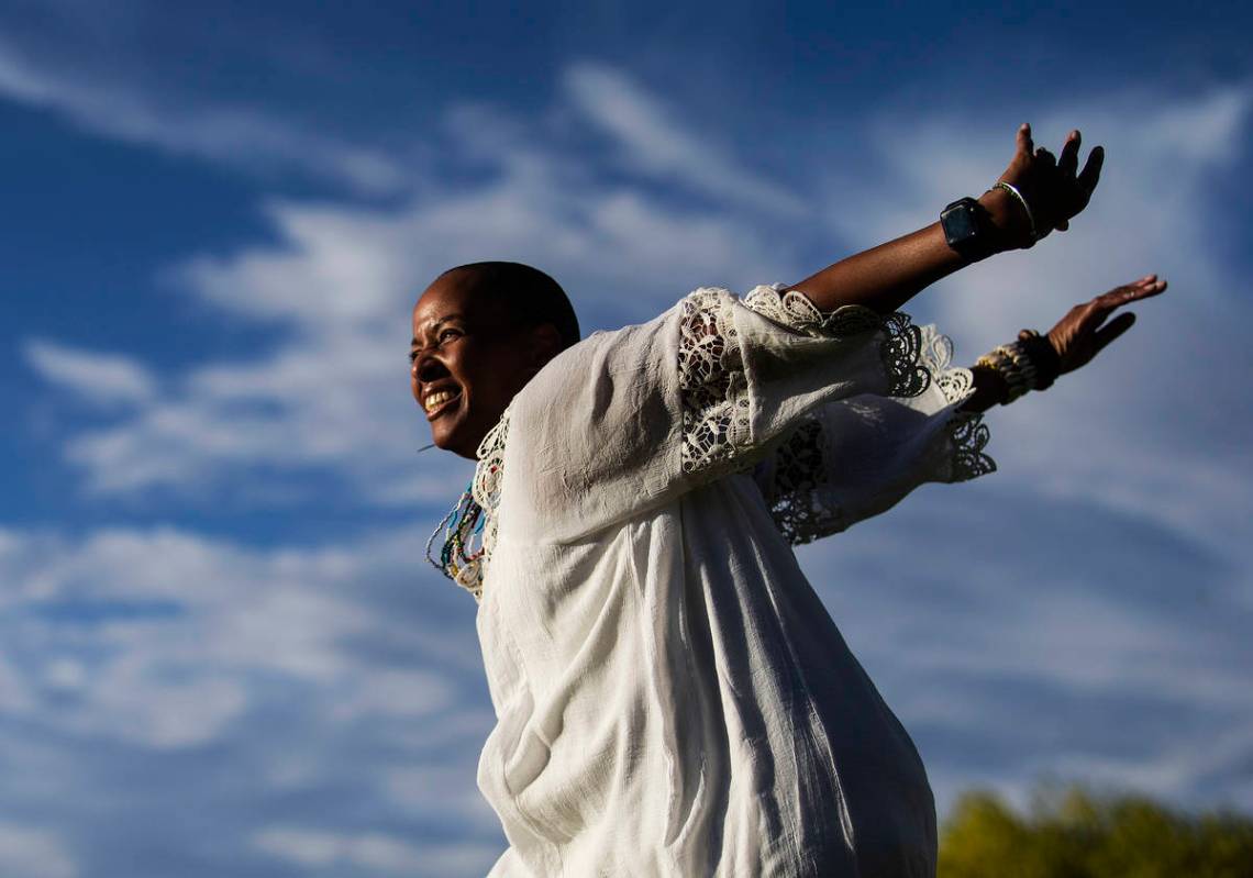 Nicole Palacio dances during at a Black Lives Matter event at Kianga Isoke Palacio Park on Frid ...