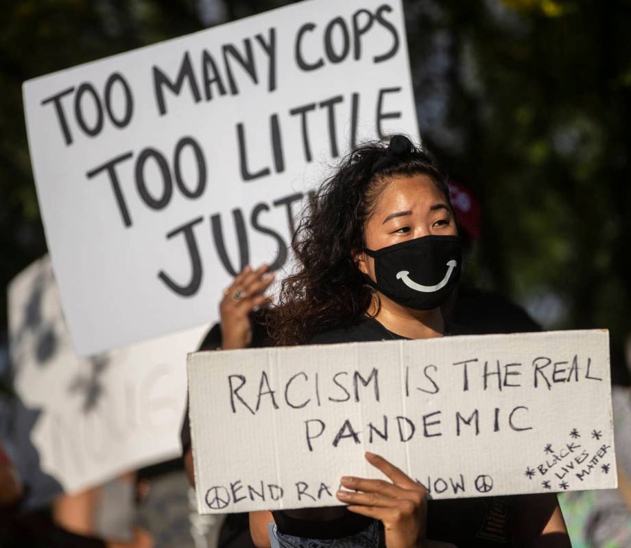 Thousands of people showed up at a Black Lives Matter event at Kianga Isoke Palacio Park on Fri ...