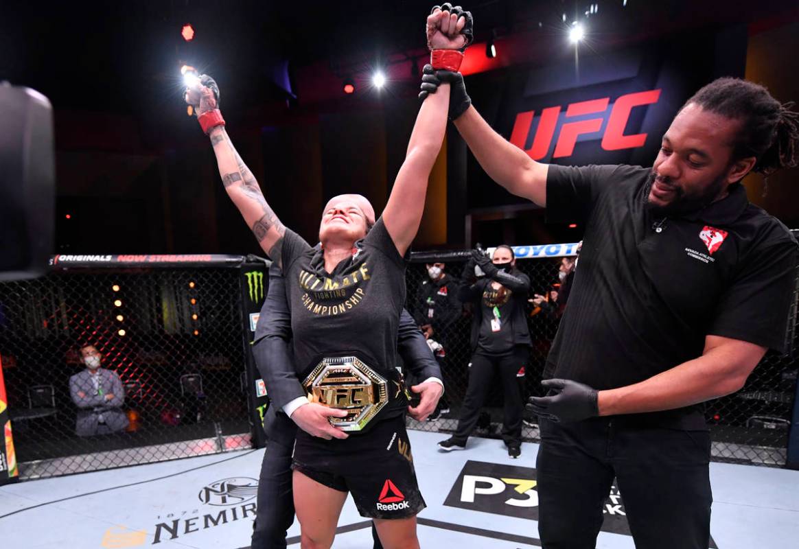 LAS VEGAS, NEVADA - JUNE 06: Amanda Nunes of Brazil celebrates after her unanimous-decision vic ...