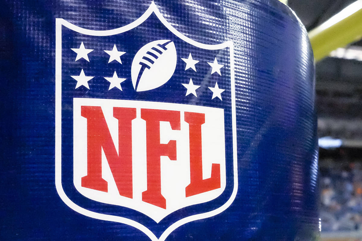 FILE - This Aug. 9, 2014 file photo shows an NFL logo on a goal post pad before a preseason NFL ...