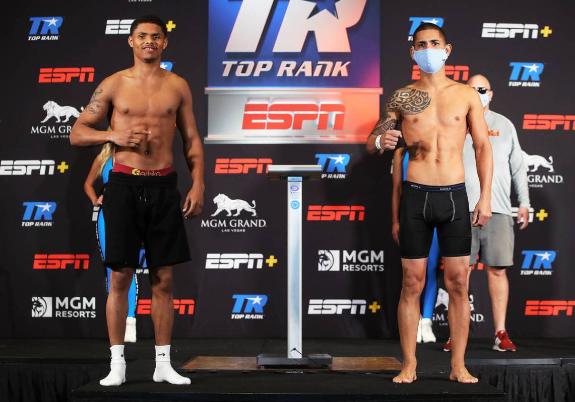 WBO featherweight champion Shakur Stevenson, left, and Felix Caraballo pose during their weigh- ...