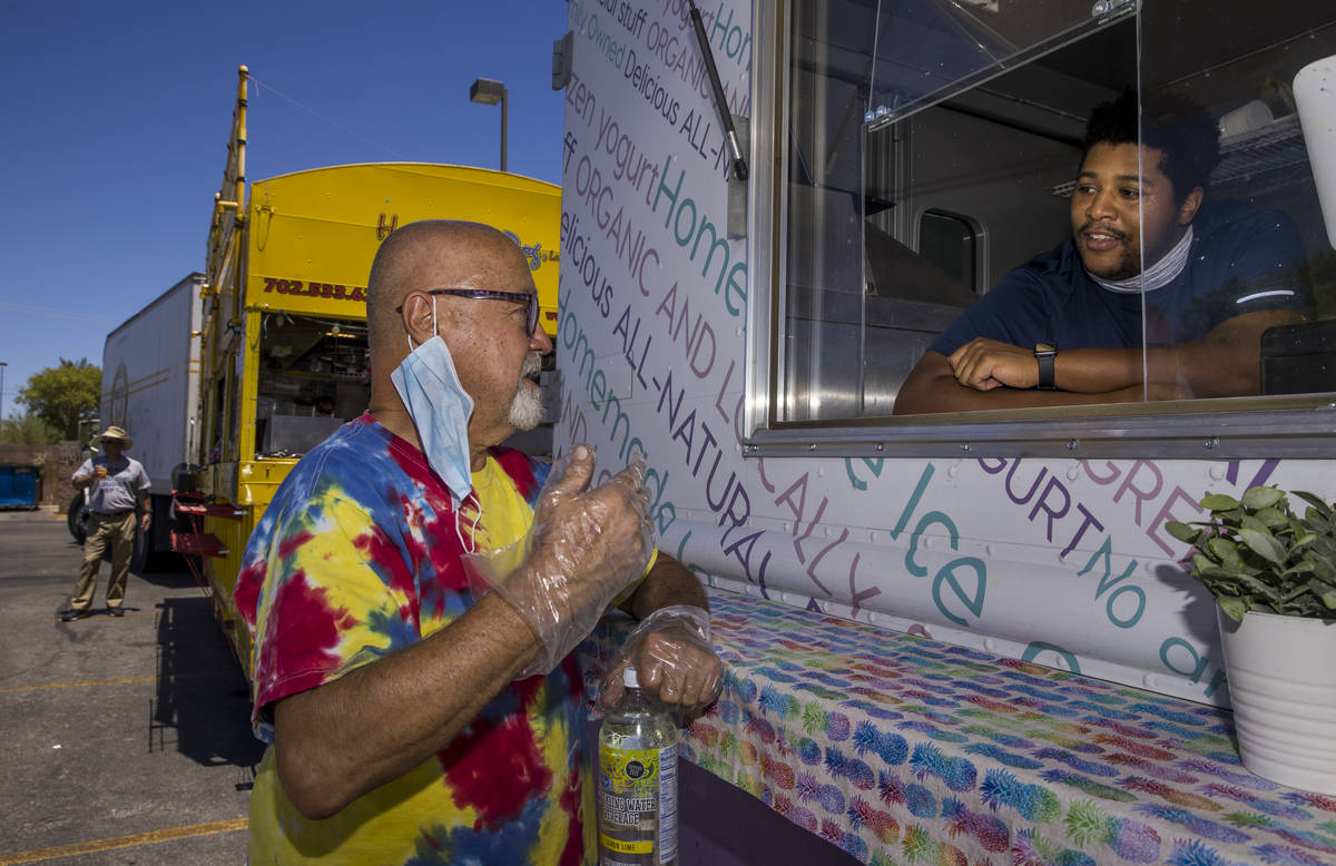 Gene Gunnels, left, of the Hot Diggity Dog Las Vegas and Jonathan Bradley of the Spoon-a-Bowl ...