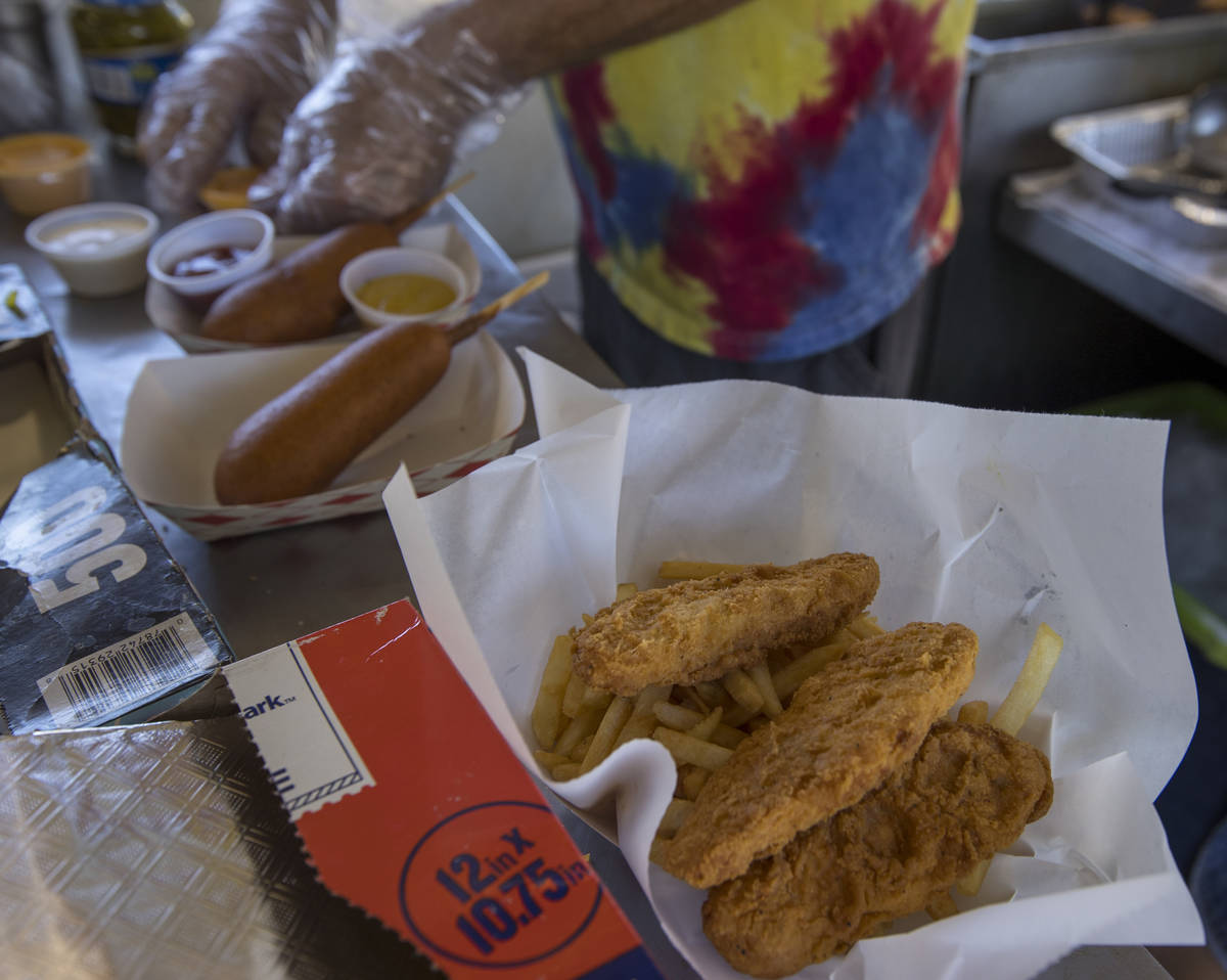 The Hot Diggity Dog Las Vegas food truck serves up some corndogs and chicken tenders with fries ...