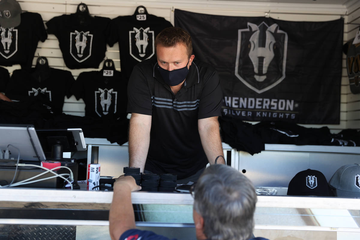 An employee of the Henderson Silver Knights pop-up shop who declined to give his name talks to ...