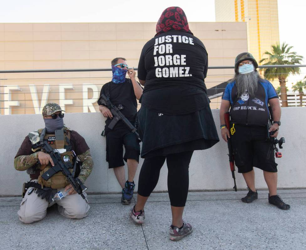 People gather outside Fashion Show mall for a vigil/march for Jorge Gomez, who was fatally shot ...