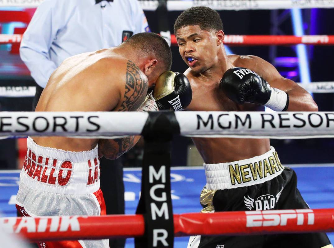 Shakur Stevenson, right, hits Felix Caraballo during their super featherweight fight Tuesday ni ...