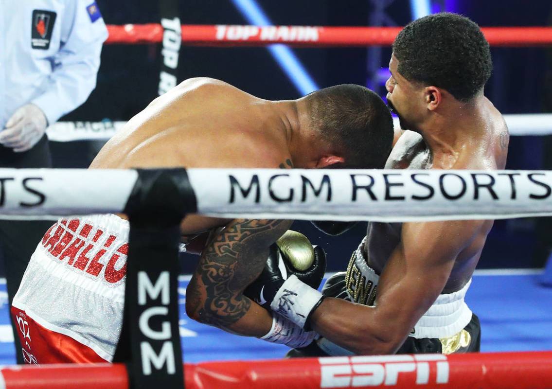 Shakur Stevenson, right, hits Felix Caraballo during their super featherweight fight Tuesday ni ...