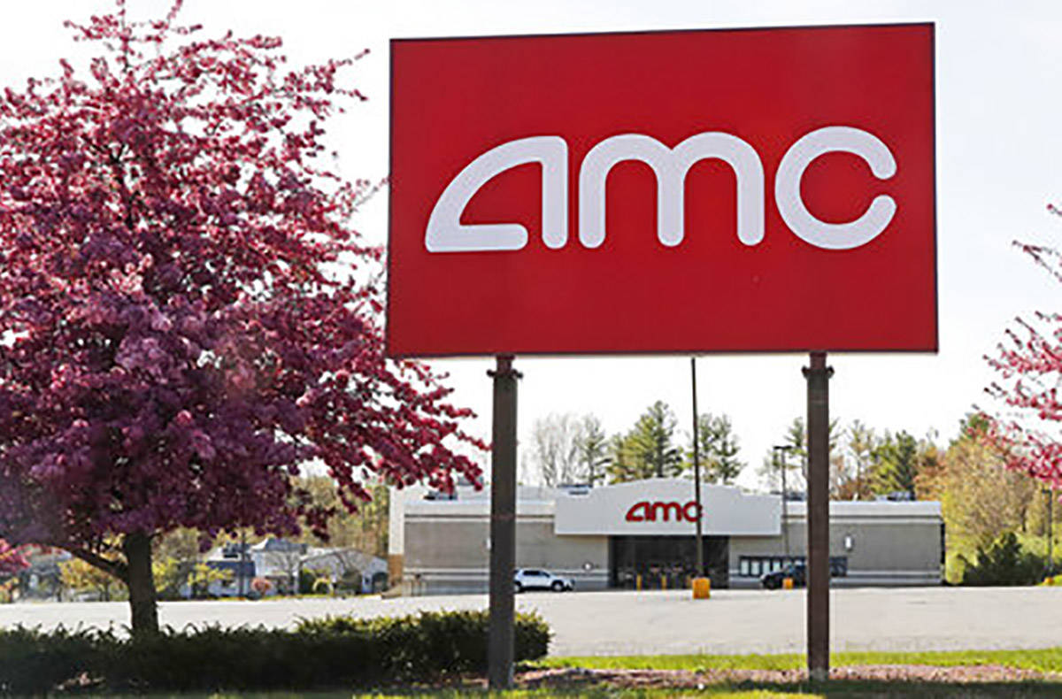This May 14, 2020, photo shows an AMC theater sign at a nearly empty parking lot for the theate ...