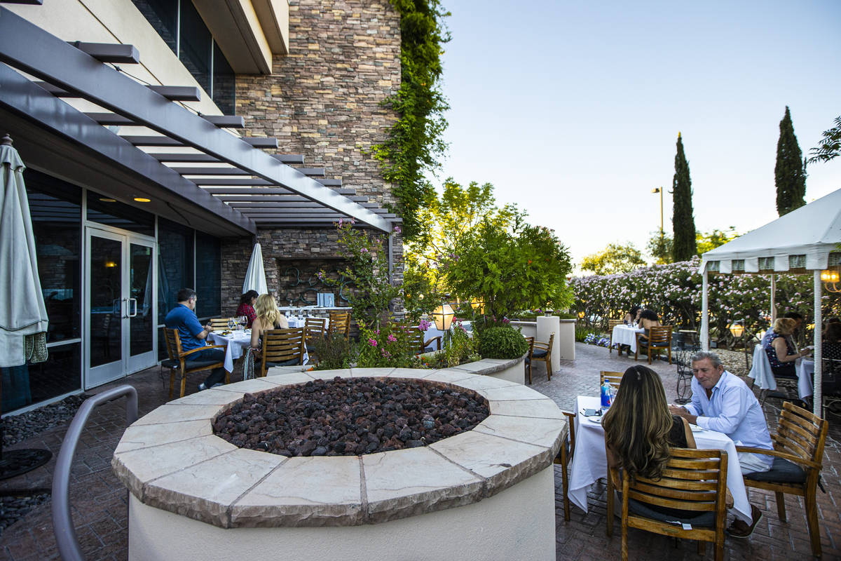 People dine outdoors at Vintner Grill in Las Vegas on Wednesday, June 10, 2020. (Chase Stevens/ ...