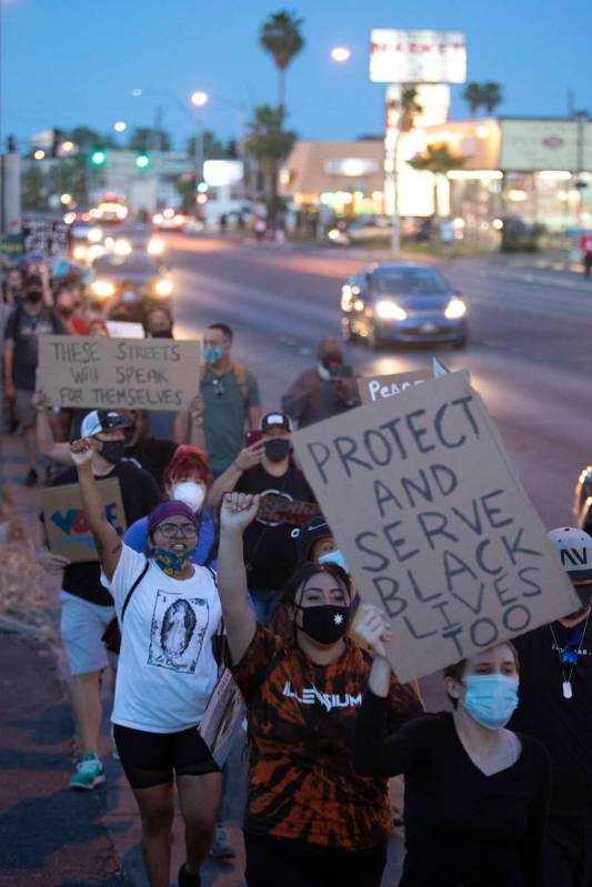 A protest against police brutality moves from Molasky Family Park to the Las Vegas Convention C ...