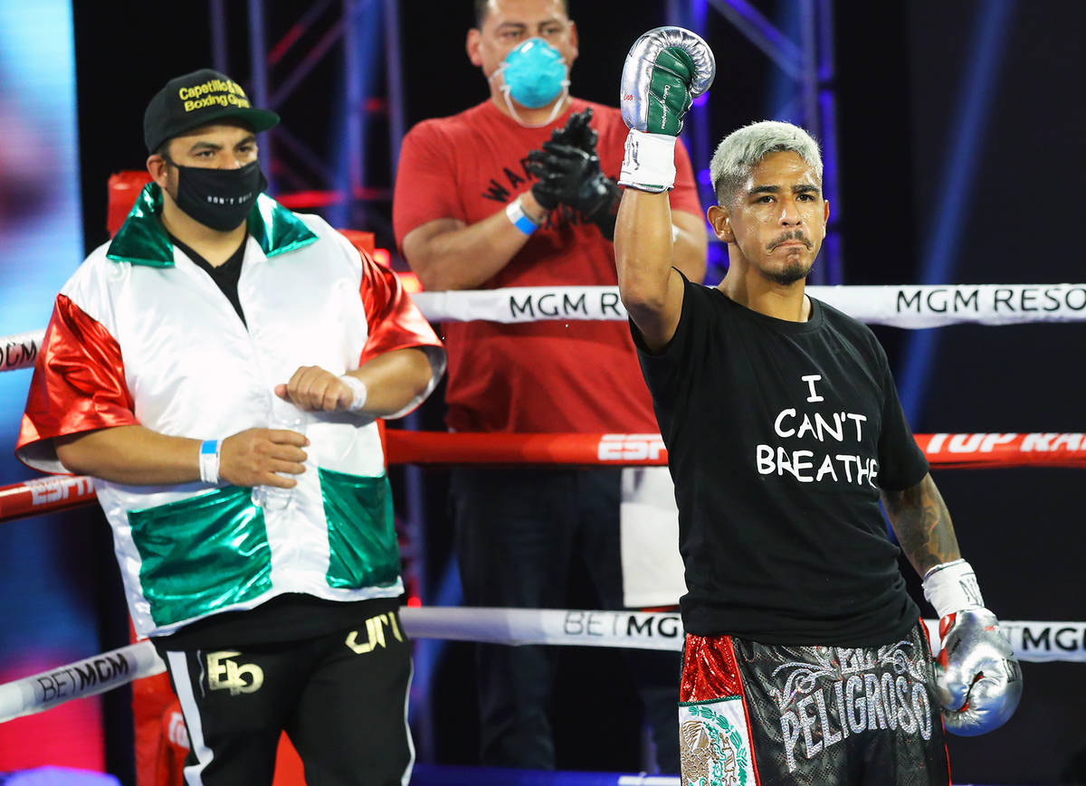 Las Vegan Jessie Magdaleno shows his support for the late George Floyd before his featherweight ...